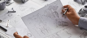 Engineer technician designing drawings mechanical parts enginee